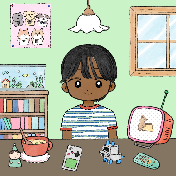 smiling boy in front of electronic toys