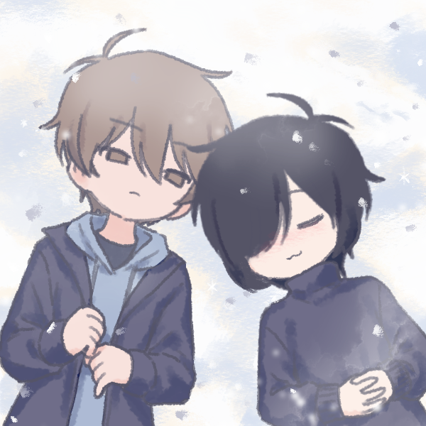 two boys lying in snow together